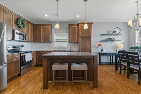 $490,000 | 647 Southwest Crestview Drive, Grain Valley, MO 64029