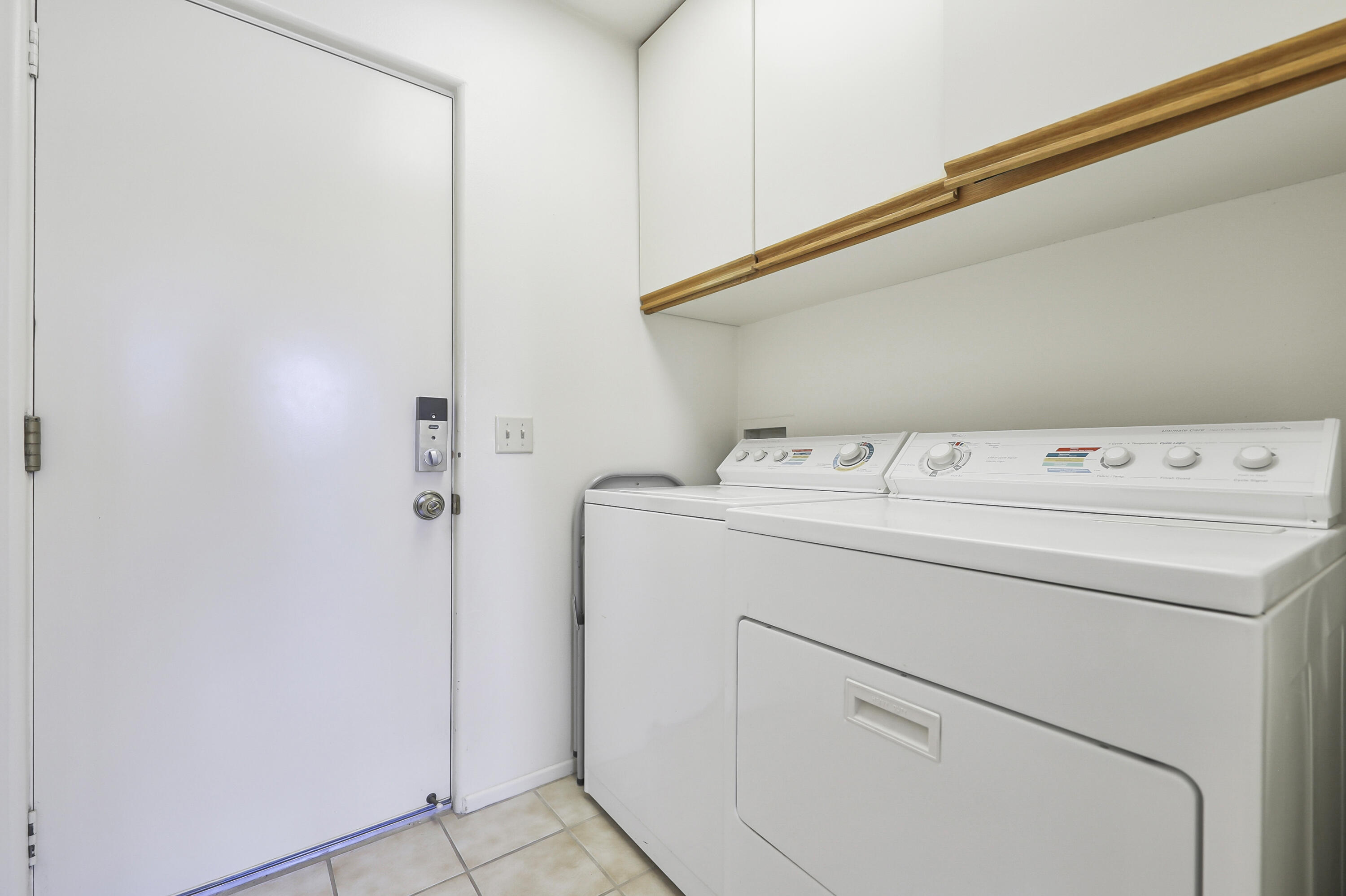 79170 Starlight Lane Bermuda Dunes, CA 92203 - Photo 12 of 33 a utility room with dryer and washer