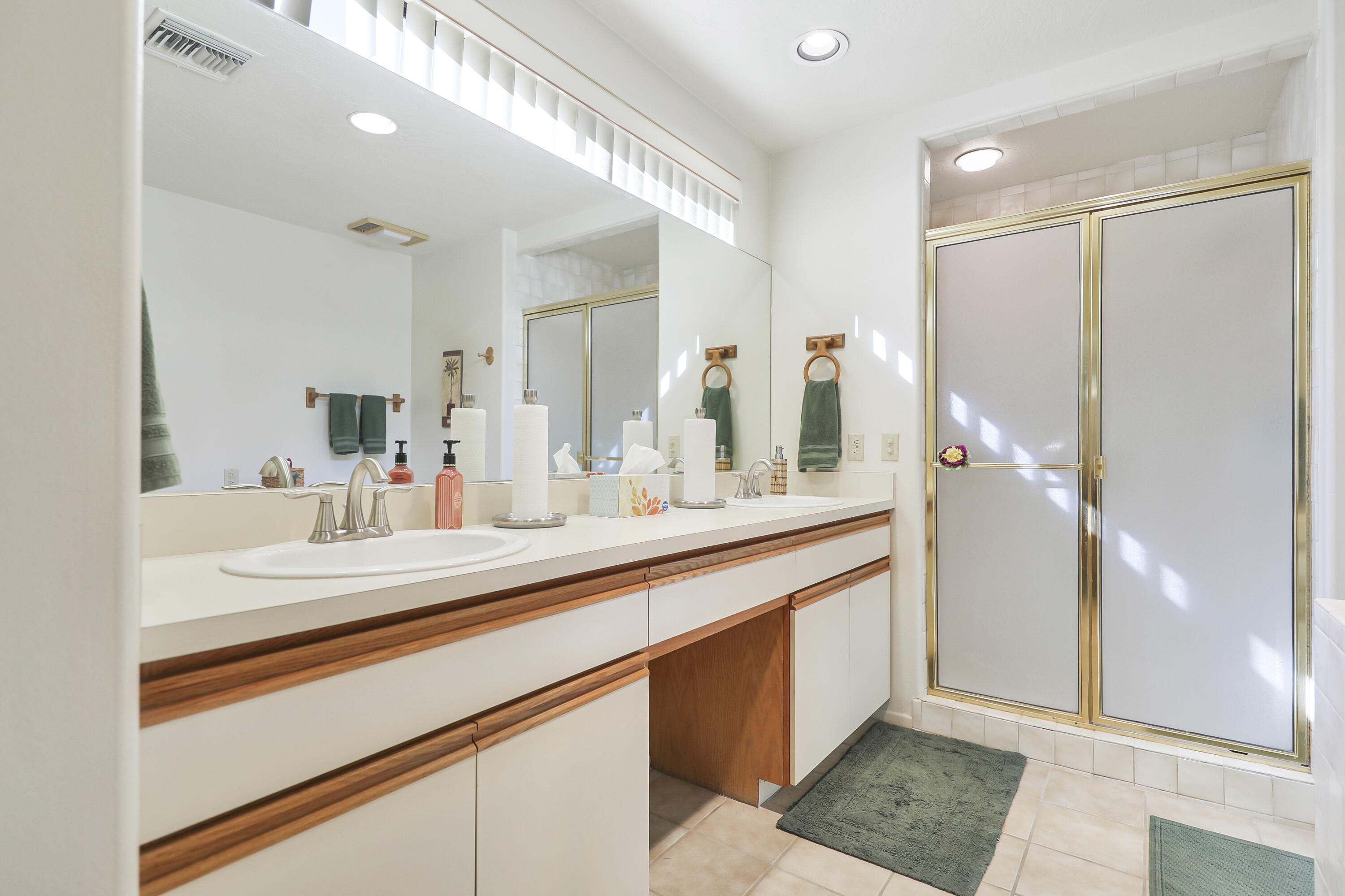 79170 Starlight Lane Bermuda Dunes, CA 92203 - Photo 15 of 33 a bathroom with a double vanity sink and mirror