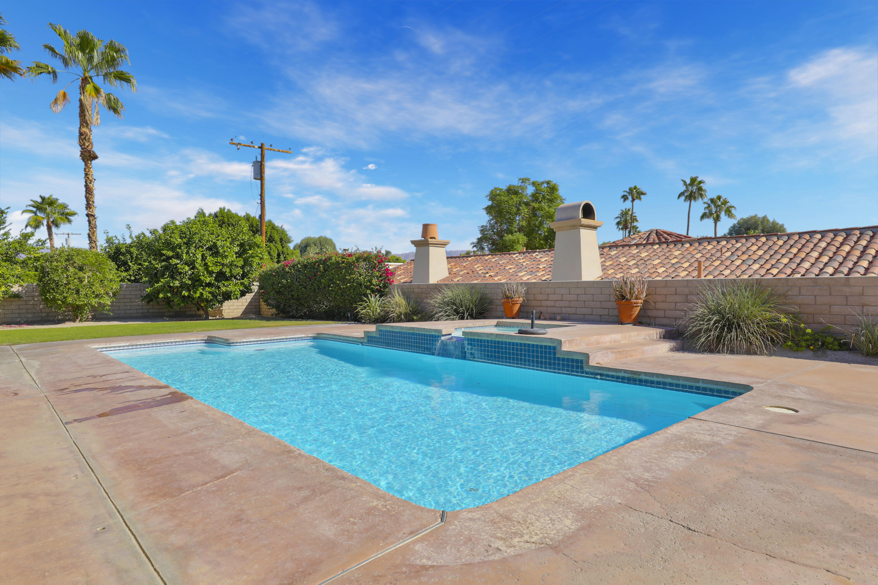 79170 Starlight Lane Bermuda Dunes, CA 92203 - Photo 27 of 33 a view of a swimming pool with a yard