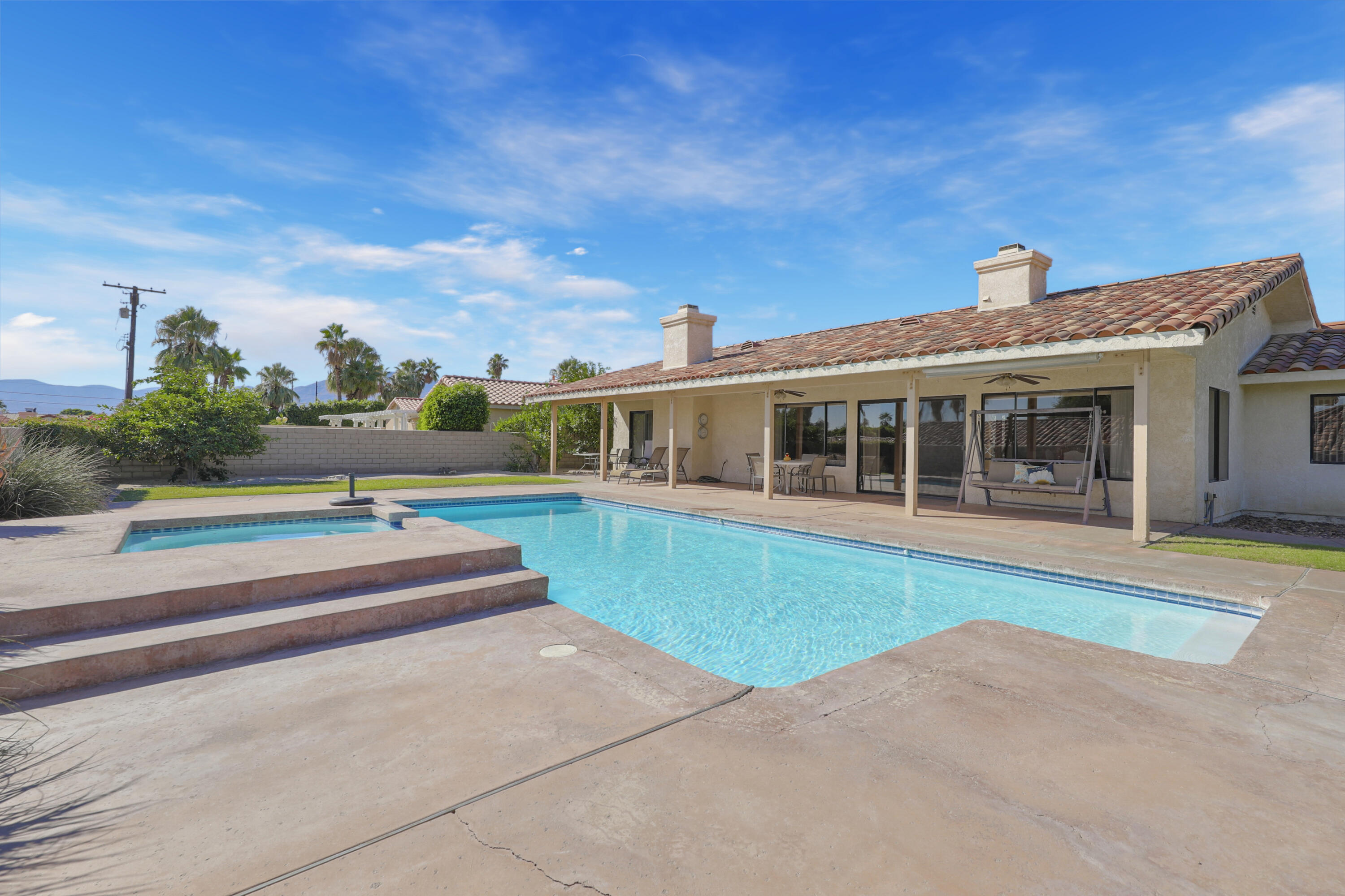 79170 Starlight Lane Bermuda Dunes, CA 92203 - Photo 29 of 33 a view of a house with a swimming pool