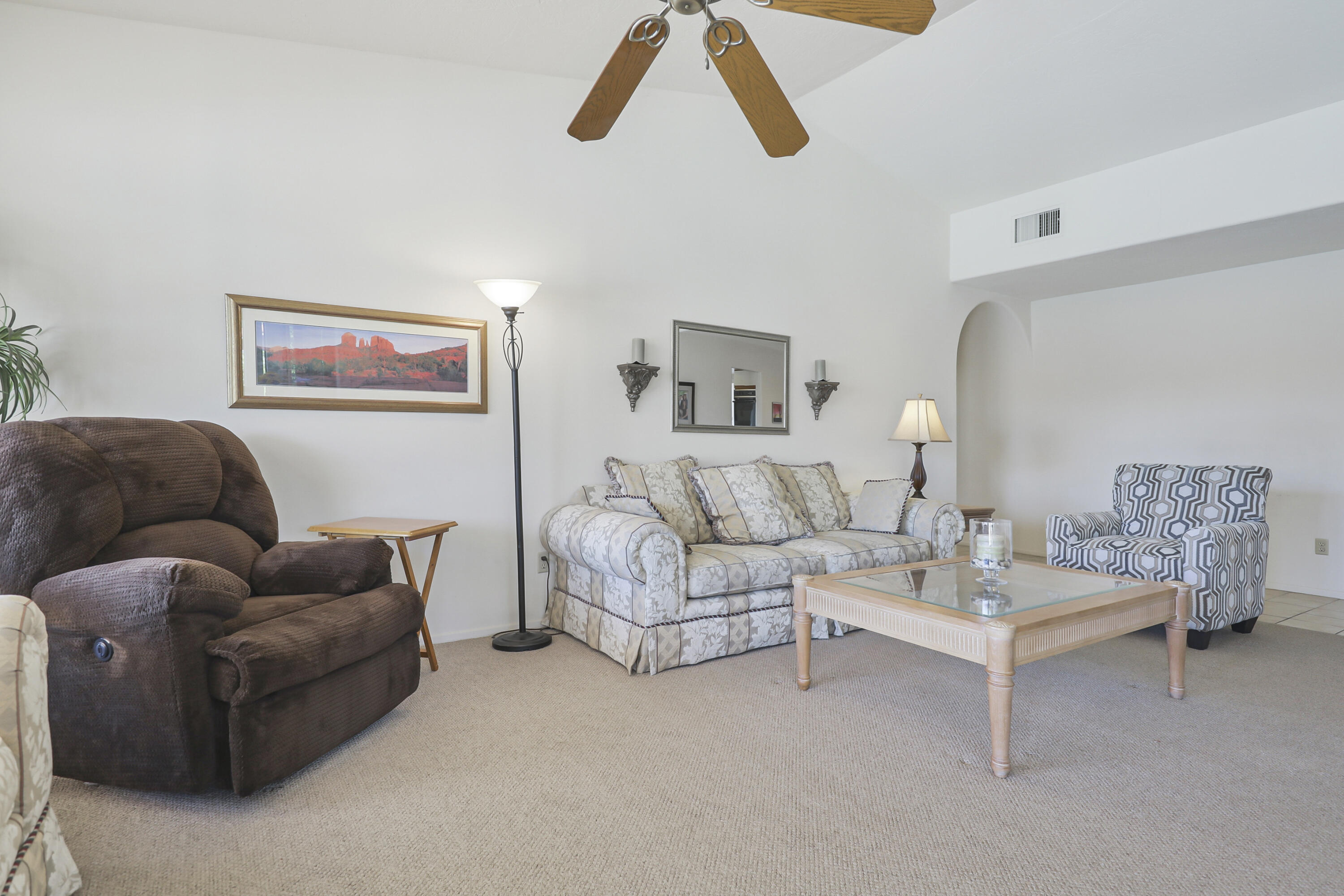 79170 Starlight Lane Bermuda Dunes, CA 92203 - Photo 10 of 33 a living room with furniture and a ceiling fan