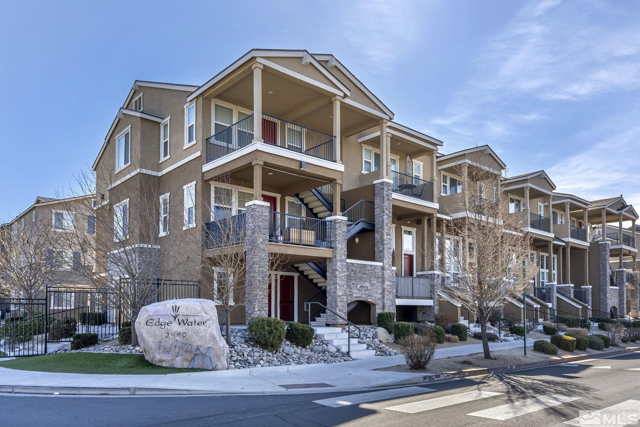 2490 Eastshore Place, Unit 401 Reno, NV 89509 - Photo 1 of 19 a front view of a multi story building