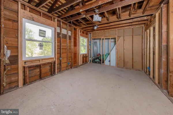 an aerial view of a yard with a barn