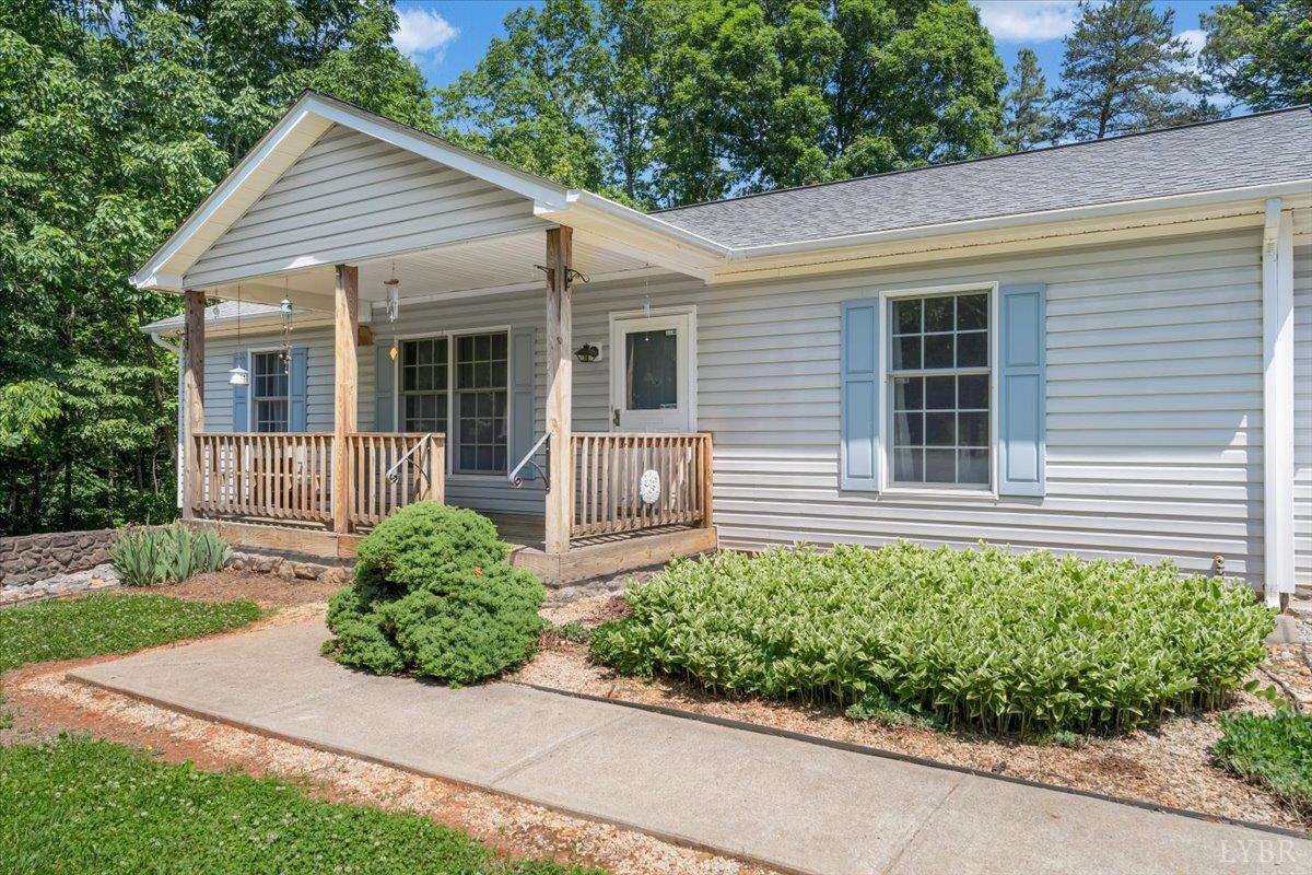 1124 Homeplace Road Bedford, VA 24523 - Photo 2 of 47 front view of a house with a small yard