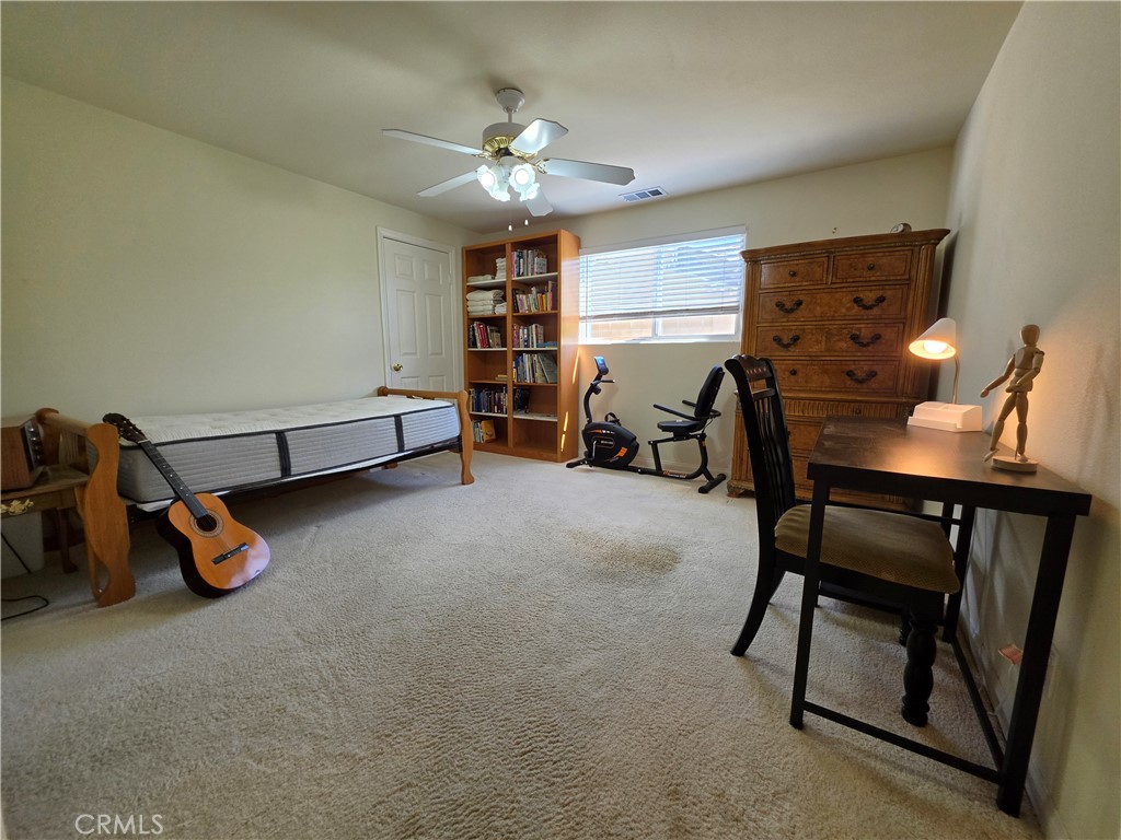 11541 Donovan Road Rossmoor, CA 90720 - Photo 33 of 51 Main level 2nd primary bedroom with walk-in closet & private en-suite 3/4 bathroom with walk-in shower