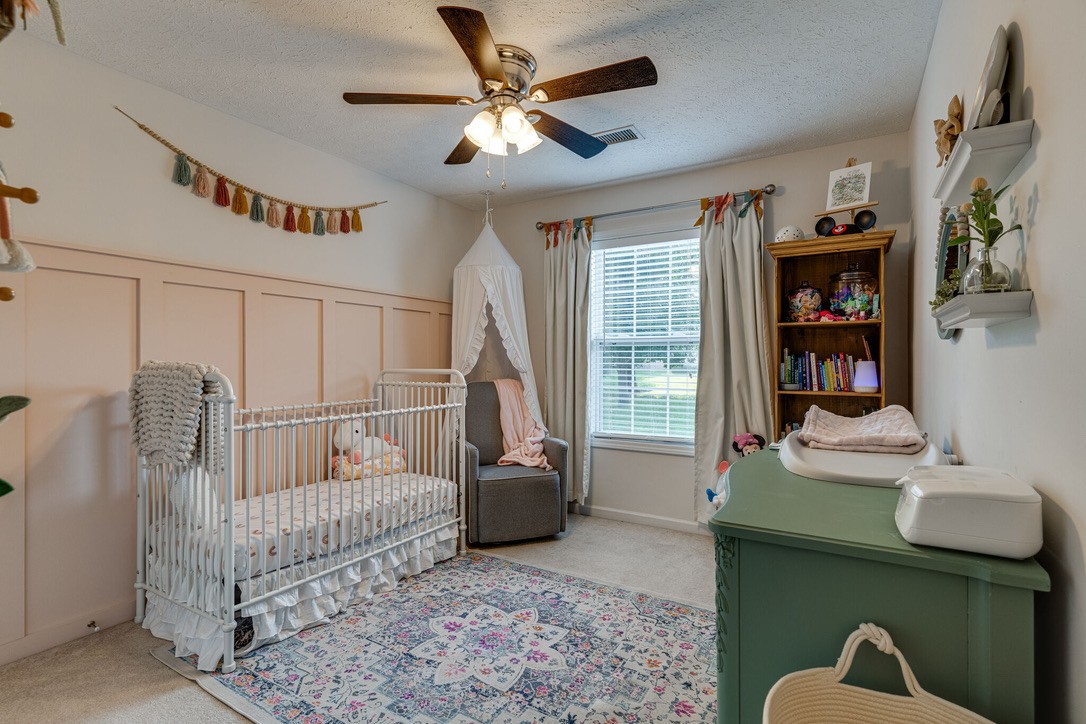 908 Chesire Court White House, TN 37188 - Photo 15 of 20 a bedroom with furniture and a window