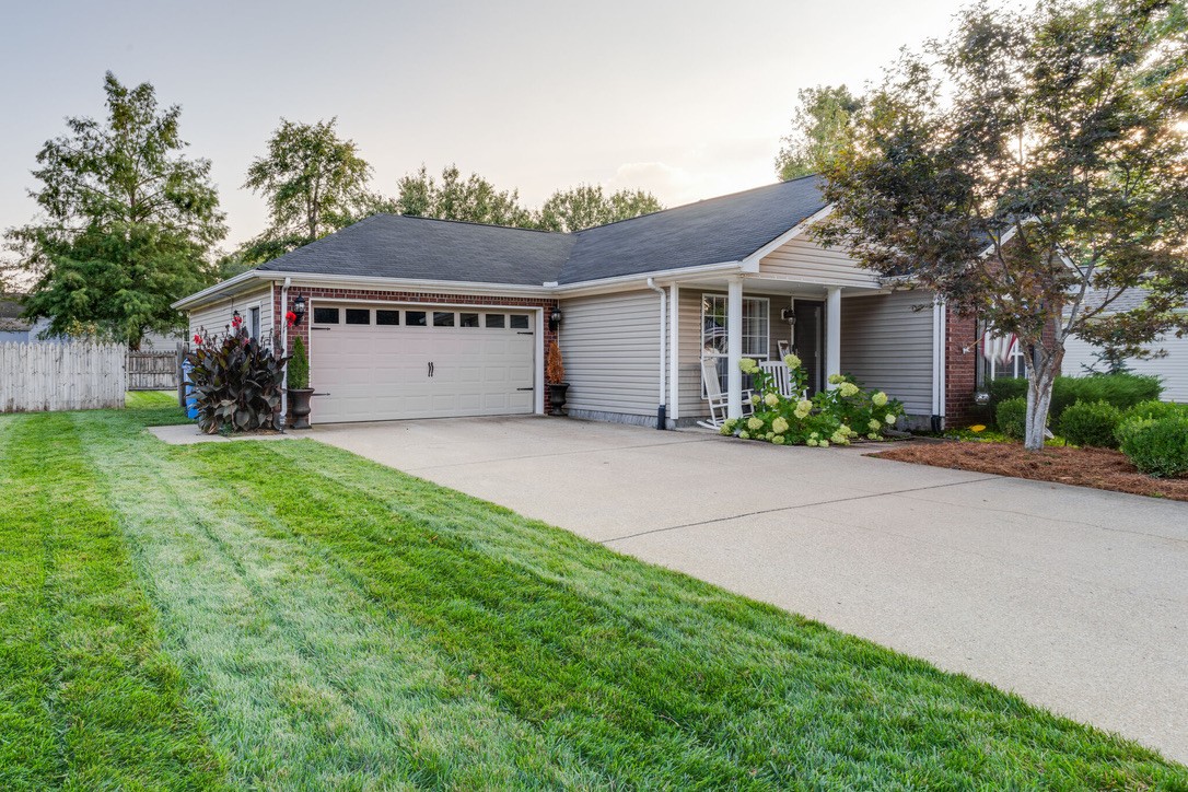 908 Chesire Court White House, TN 37188 - Photo 2 of 20 front view of a house with a yard