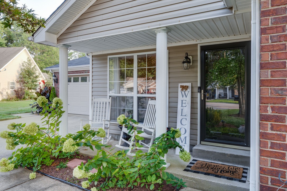 908 Chesire Court White House, TN 37188 - Photo 3 of 20 a front view of a house with a porch