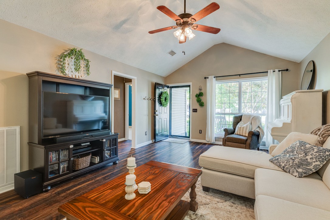 908 Chesire Court White House, TN 37188 - Photo 4 of 20 a living room with furniture and a flat screen tv