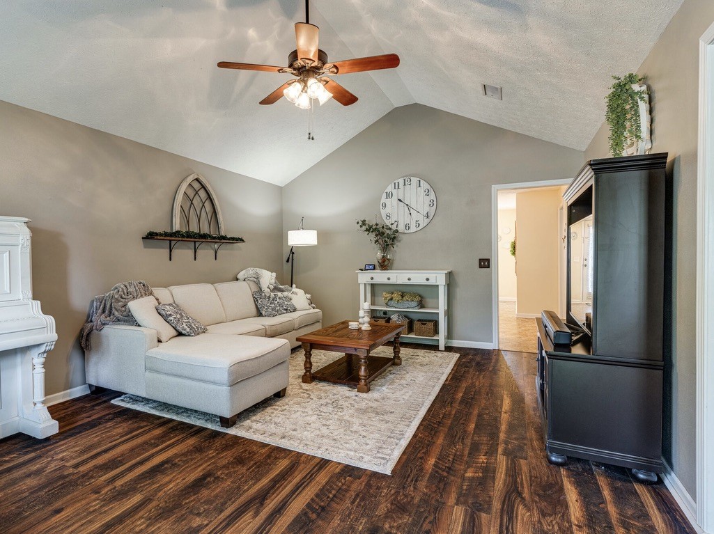 908 Chesire Court White House, TN 37188 - Photo 5 of 20 a living room with furniture a fireplace and a chandelier