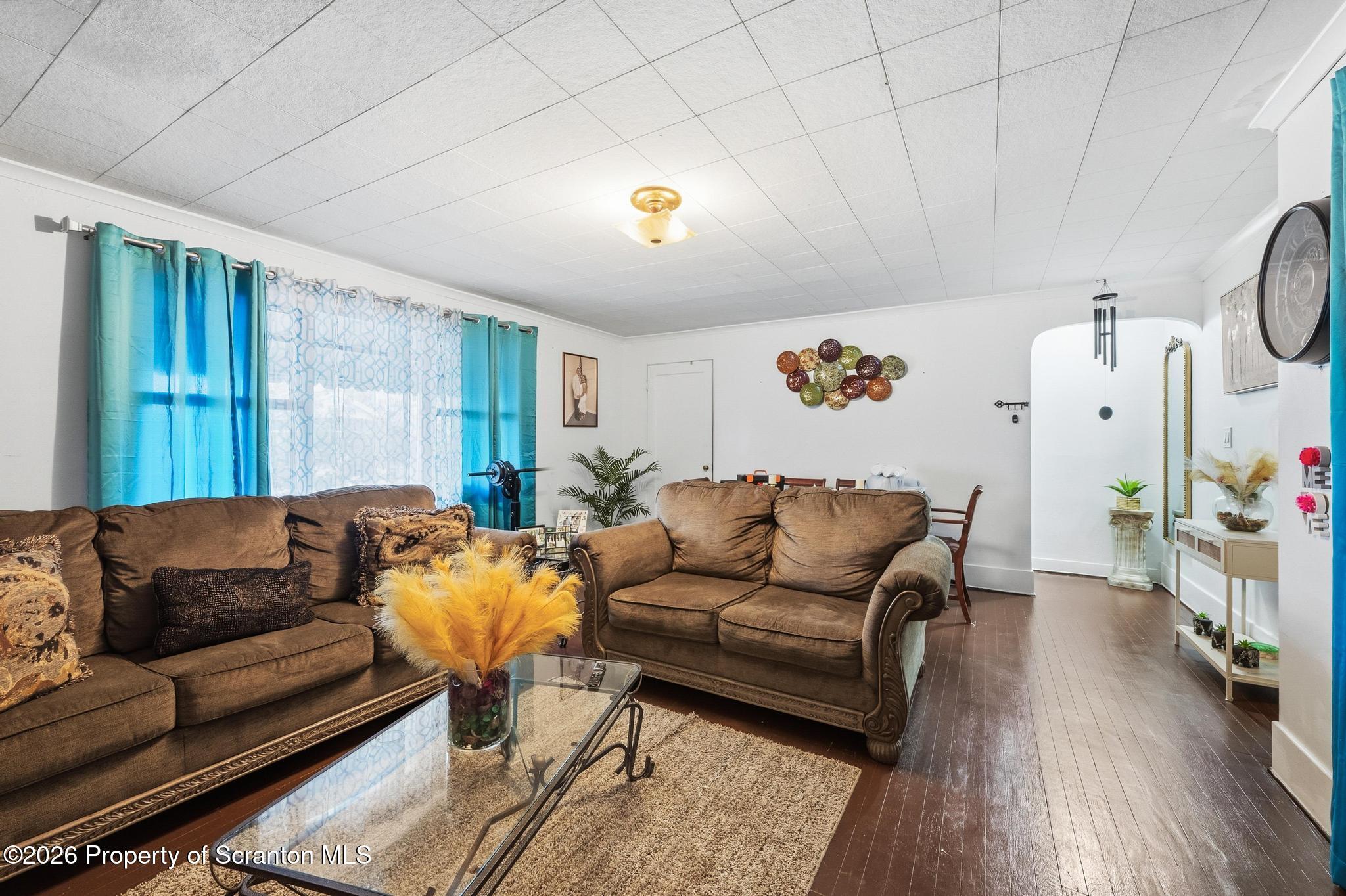 433 Willow Street Scranton, PA 18505 - Photo 28 of 61 a living room with furniture and wooden floor