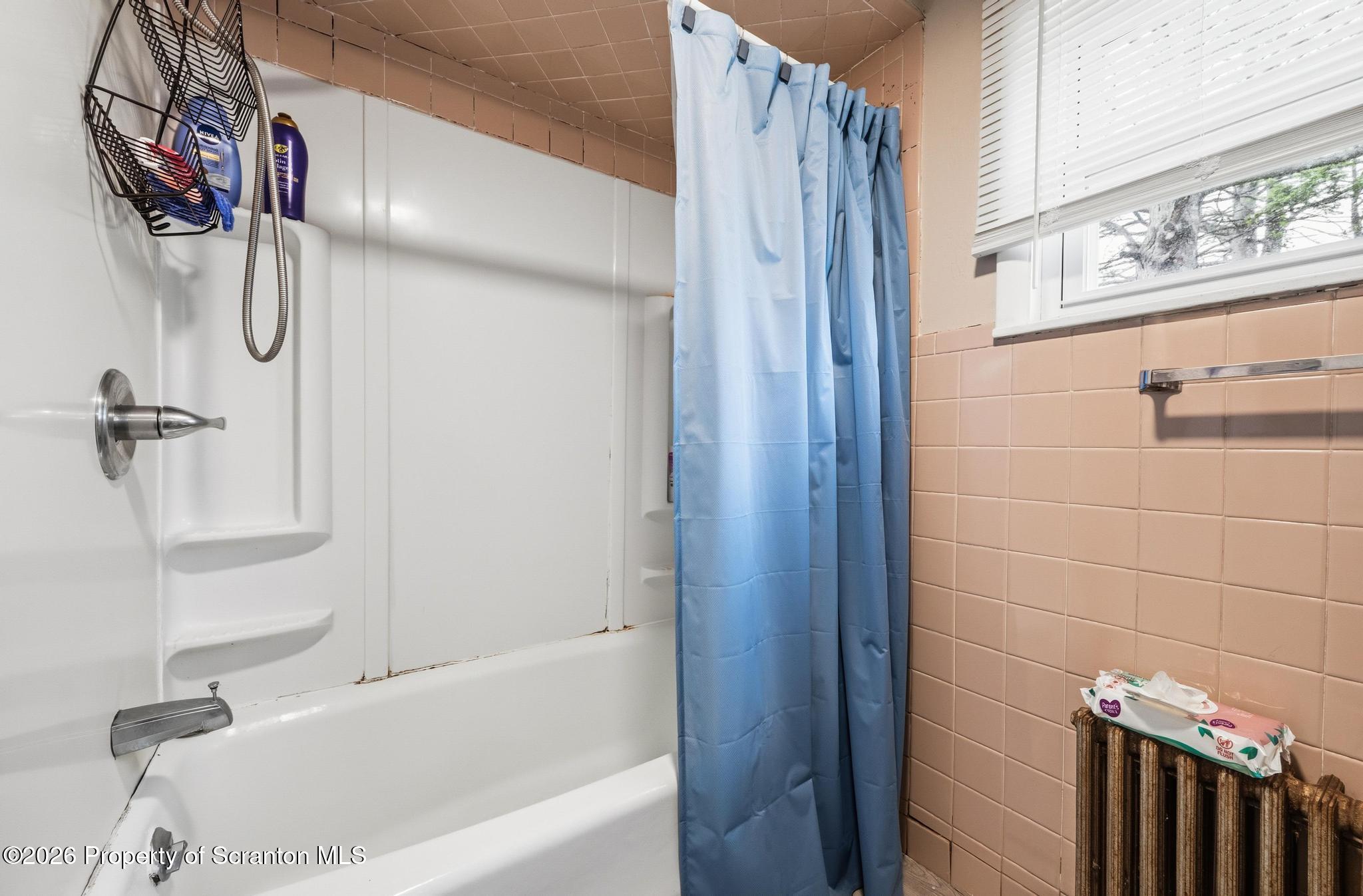 433 Willow Street Scranton, PA 18505 - Photo 36 of 61 a bathroom with a bathtub and shower