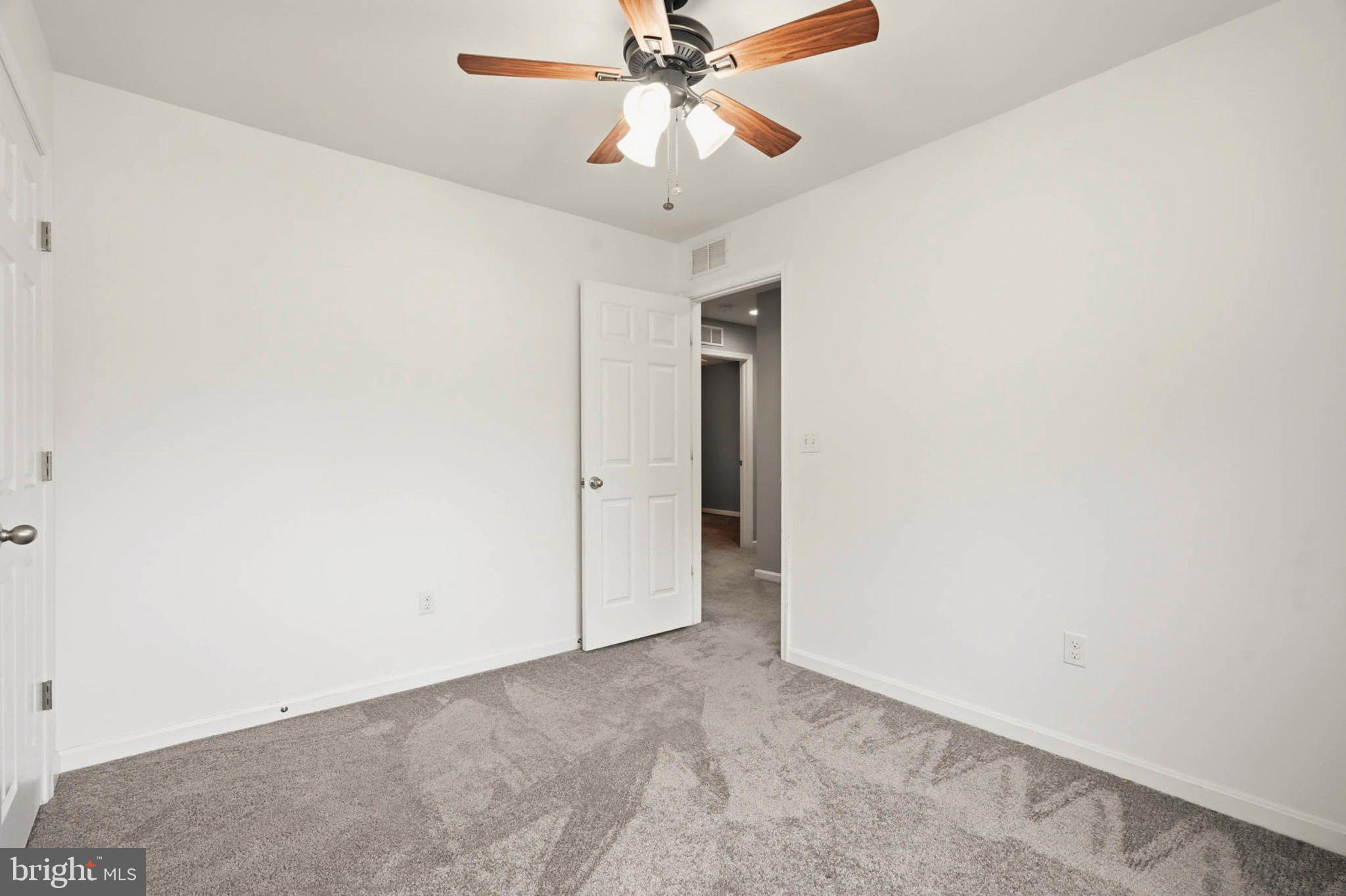 706 Trapper Way Deale, MD 20751 - Photo 35 of 61 Bright and airy room with ceiling fan.