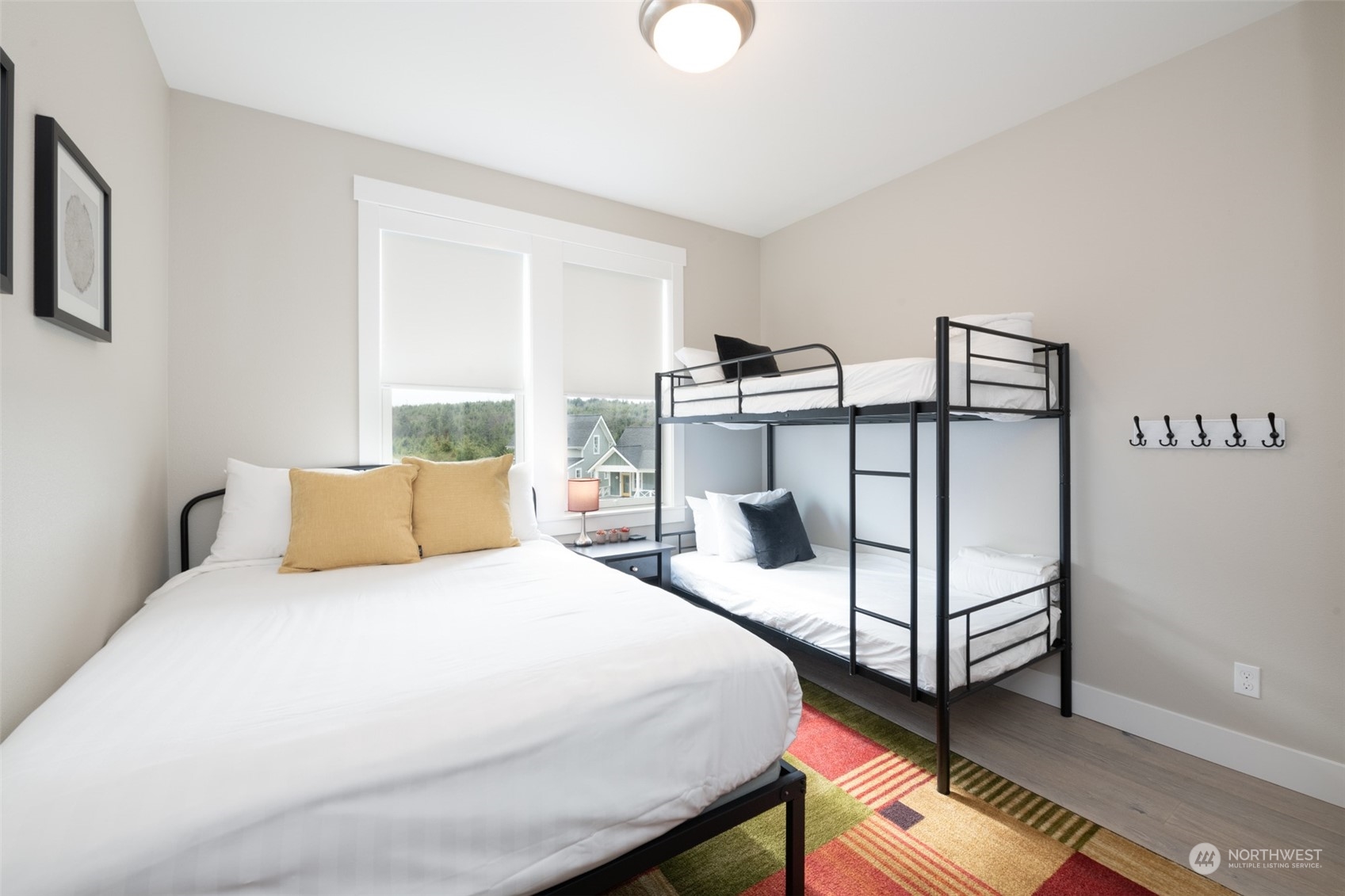 16 Barnhill Loop Pacific Beach, WA 98571 - Photo 14 of 31 a bedroom with a bed and a window