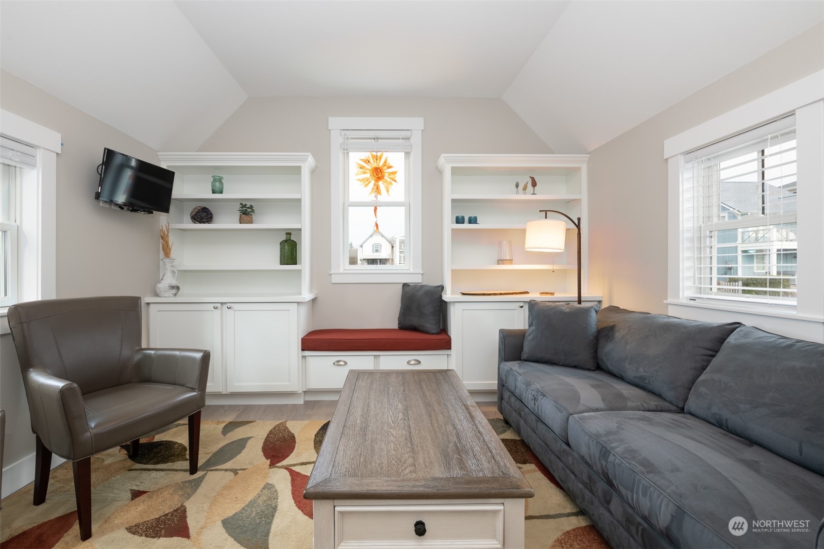 16 Barnhill Loop Pacific Beach, WA 98571 - Photo 24 of 31 a living room with furniture and a flat screen tv