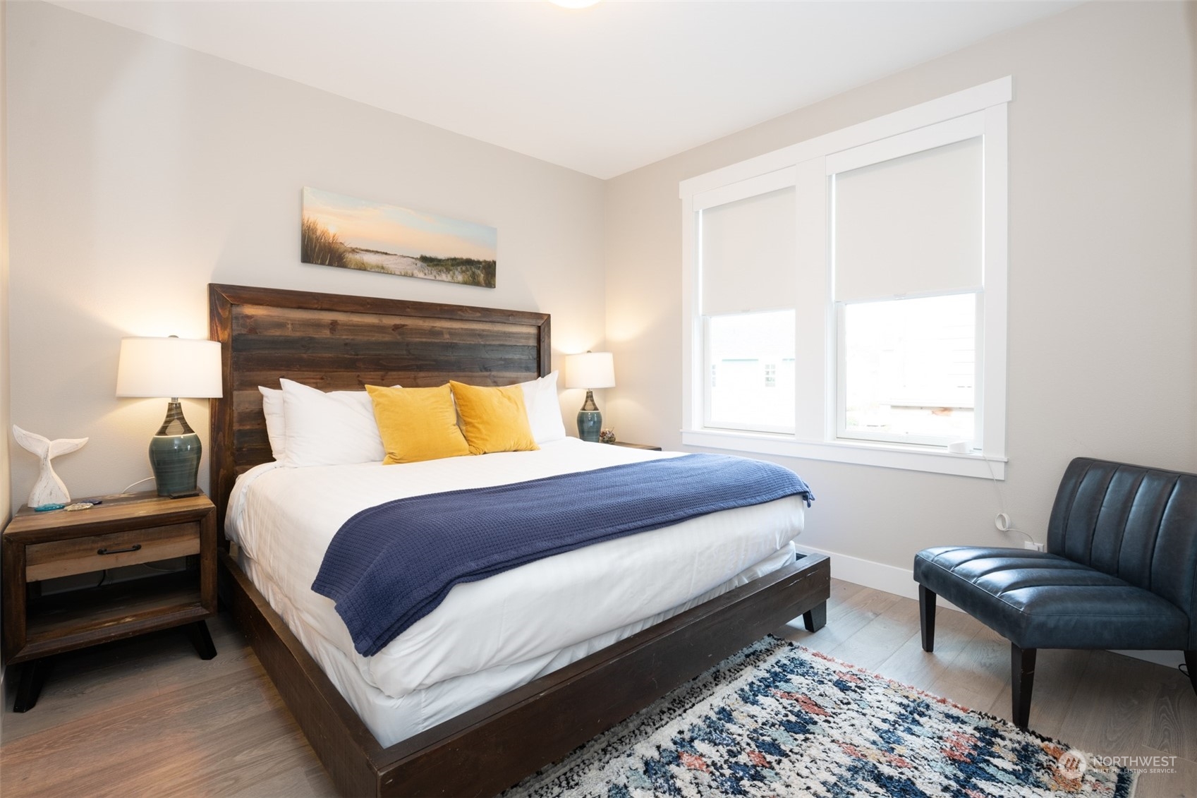 16 Barnhill Loop Pacific Beach, WA 98571 - Photo 10 of 31 a bedroom with a bed a couch and a dresser next to a window