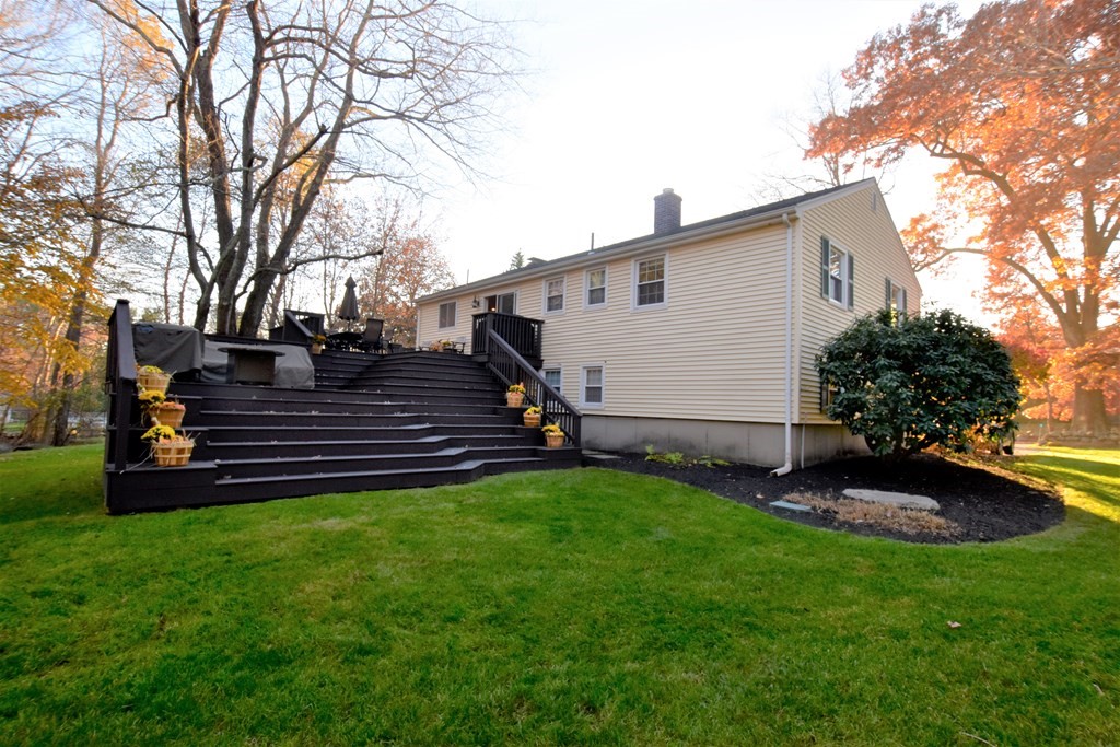 82 Wyman Road Billerica, MA 01821 - Photo 28 of 28 a view of a backyard with plants and a garden