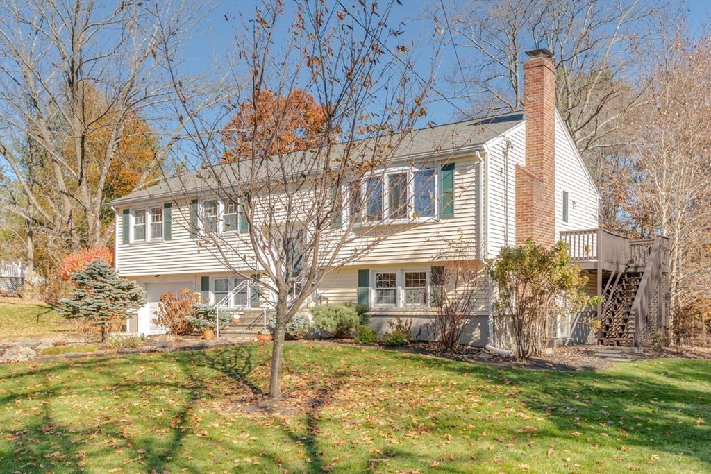 82 Wyman Road Billerica, MA 01821 - Photo 3 of 28 a view of a house with a yard