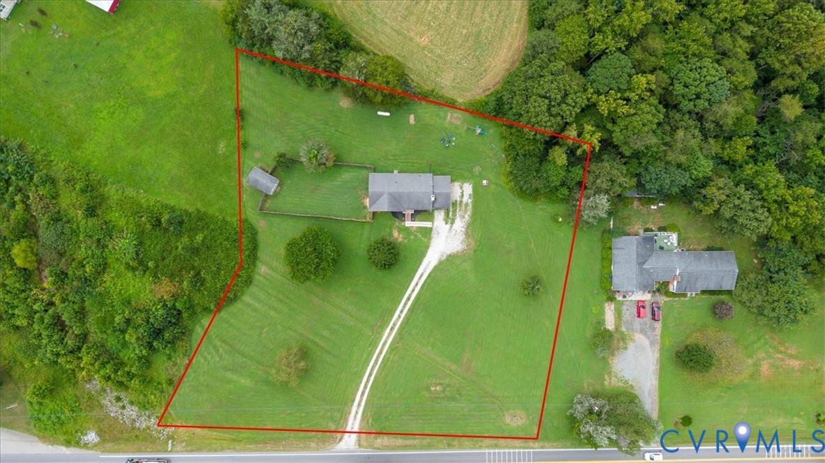 3279 Broad St Road Gum Spring, VA 23065 - Photo 42 of 48 an aerial view of a residential houses with outdoor space and trees