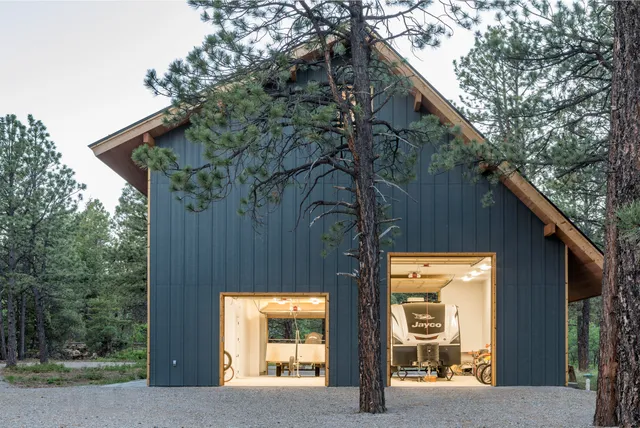 a building outdoor space with patio furniture and potted plants