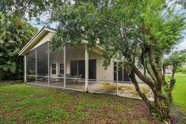 a backyard of a house with lots of green space