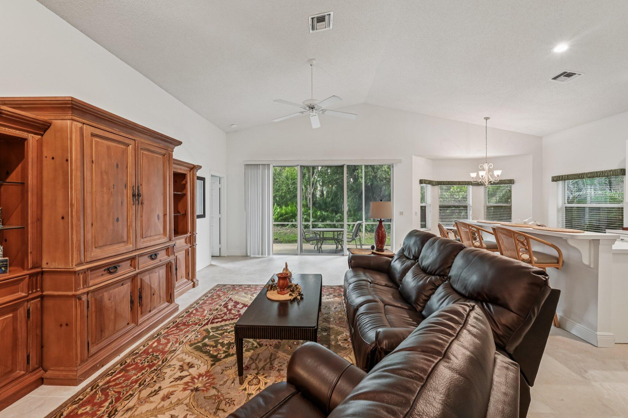 7184 Southeast Magellan Lane Stuart, FL 34997 - Photo 7 of 34 a living room with furniture and a window