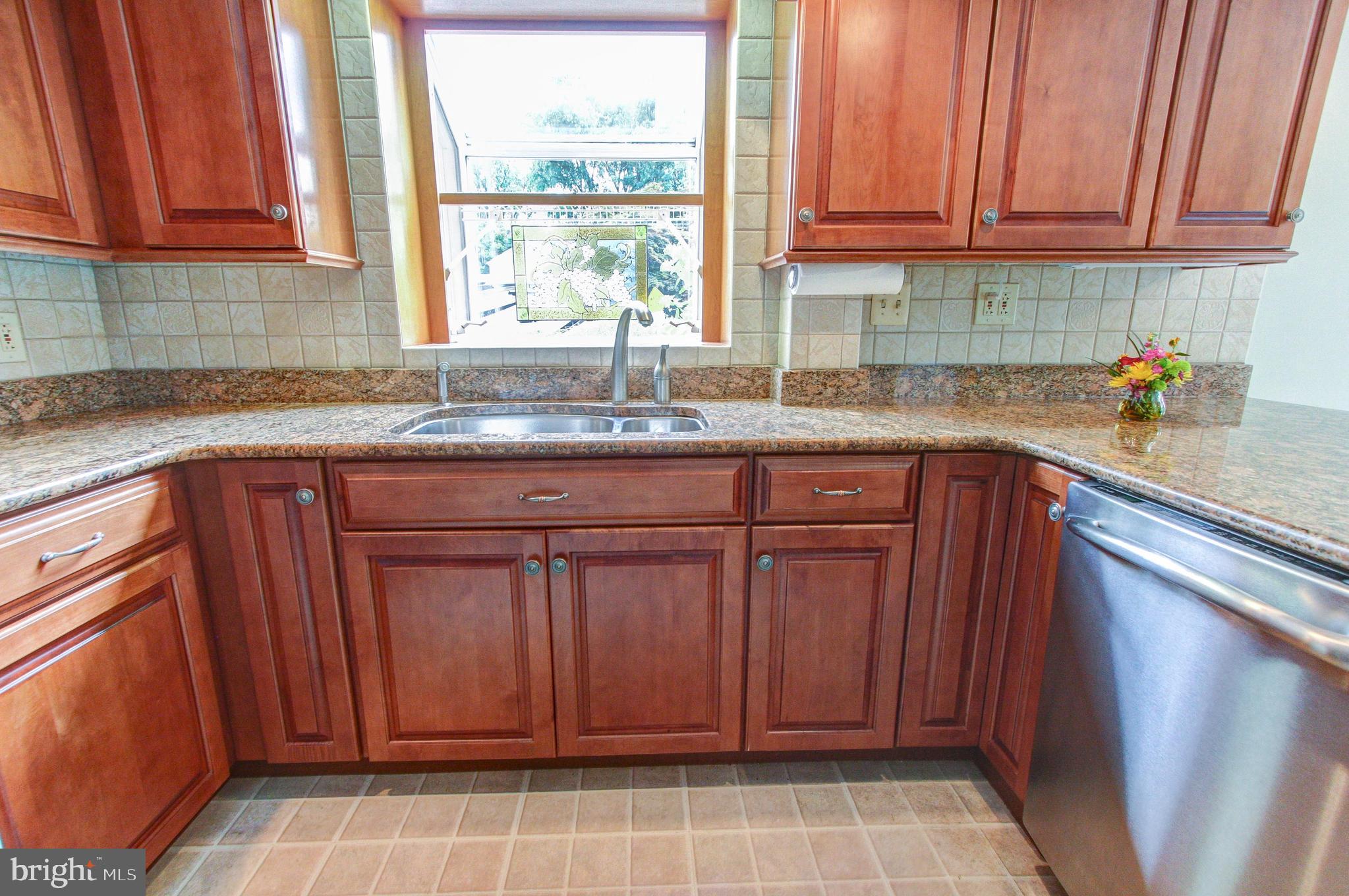 Cherry cabinets, GE Profile stainless appliances