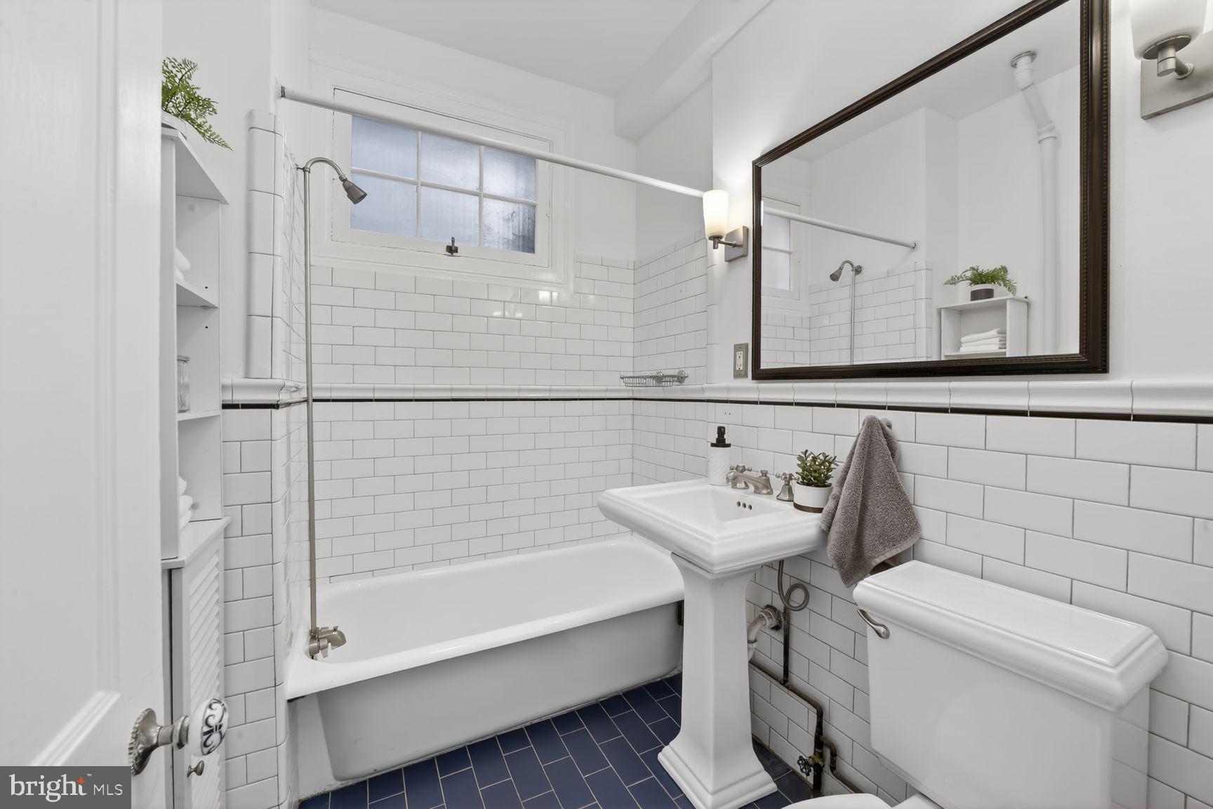 2707 Adams Mill Road Northwest, Unit 400 Washington, DC 20009 - Photo 17 of 21 Charming bathroom with classic tiles.