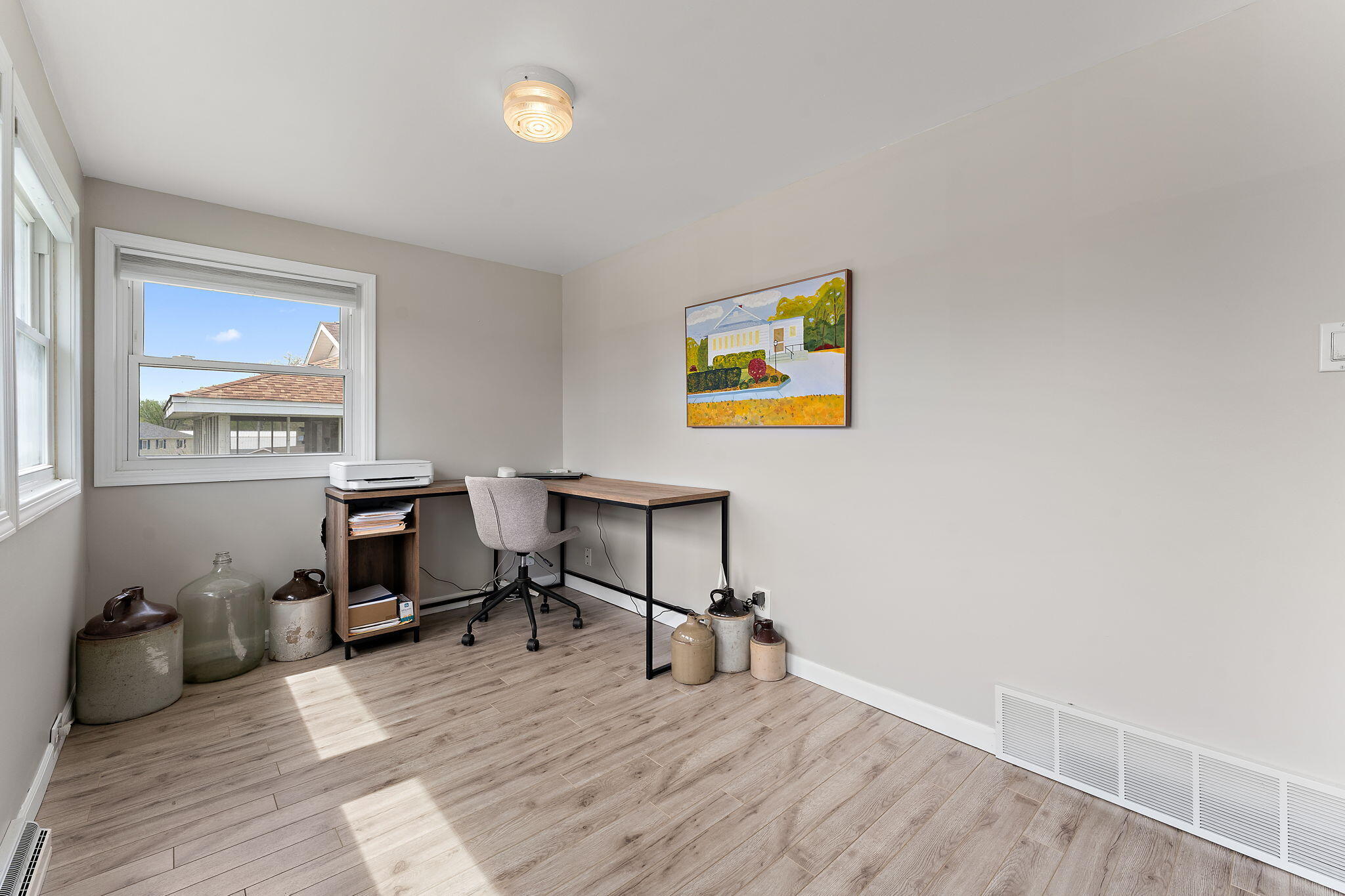 5590 East Maple Street Knox, IN 46534 - Photo 12 of 32 a workspace with furniture and wooden floor