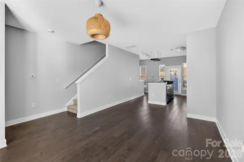 a view of a kitchen cabinets and wooden floor