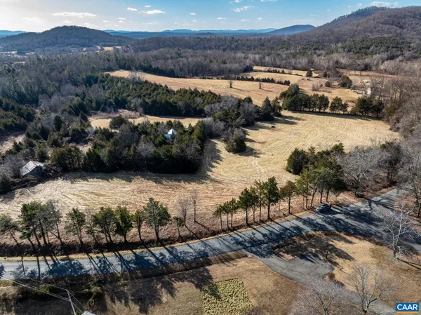 a view of a lake with mountain