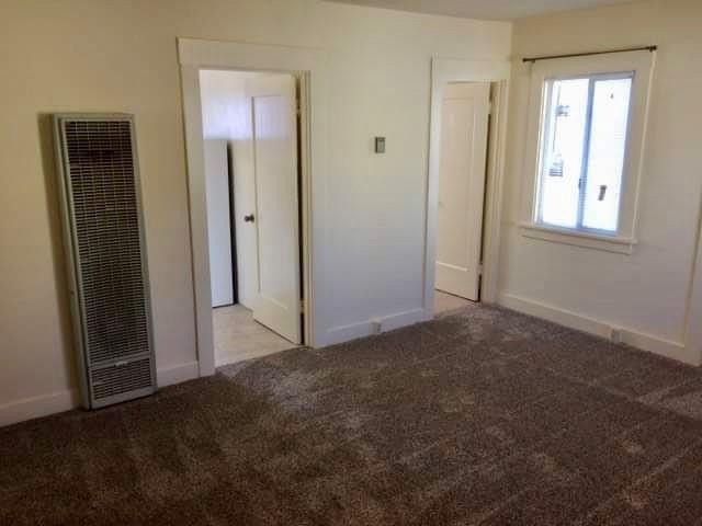 224 Abbott Street Salinas, CA 93901 - Photo 6 of 10 an empty room that has a window in it