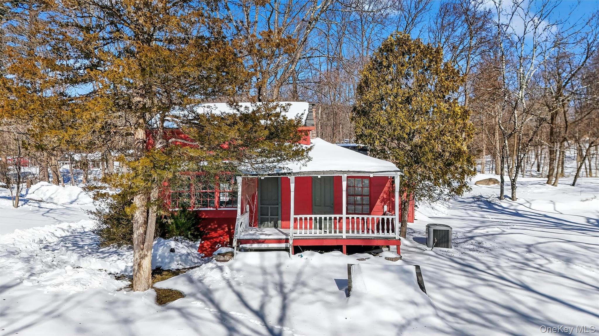 18 High Tor Road New City, NY 10956 - Photo 3 of 10 a view of backyard with a small cabin and wooden fence