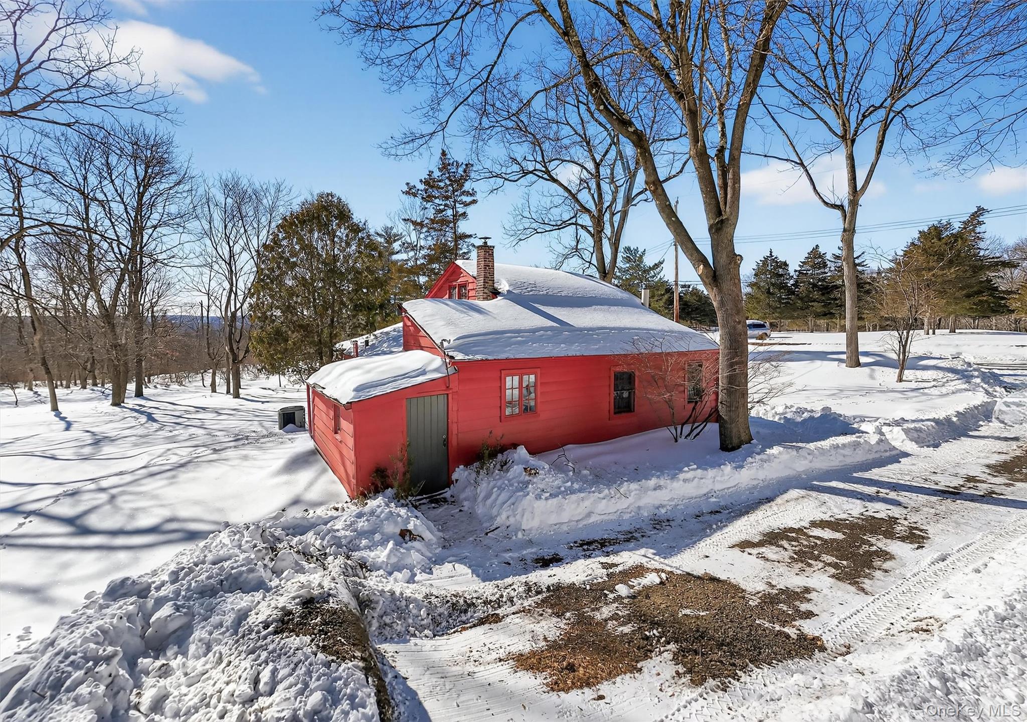 18 High Tor Road New City, NY 10956 - Photo 7 of 10 a view of a backyard with snow on the house