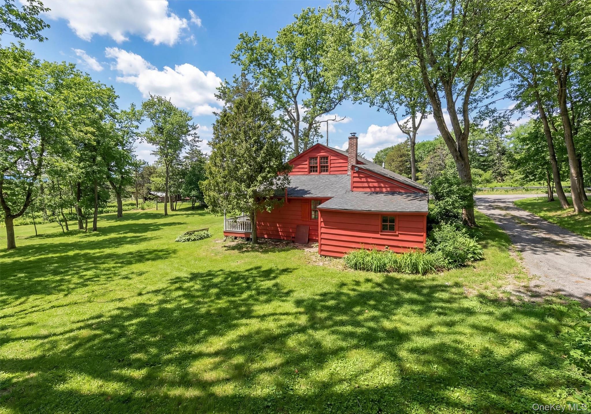 18 High Tor Road New City, NY 10956 - Photo 9 of 10 a backyard of a house with lots of green space