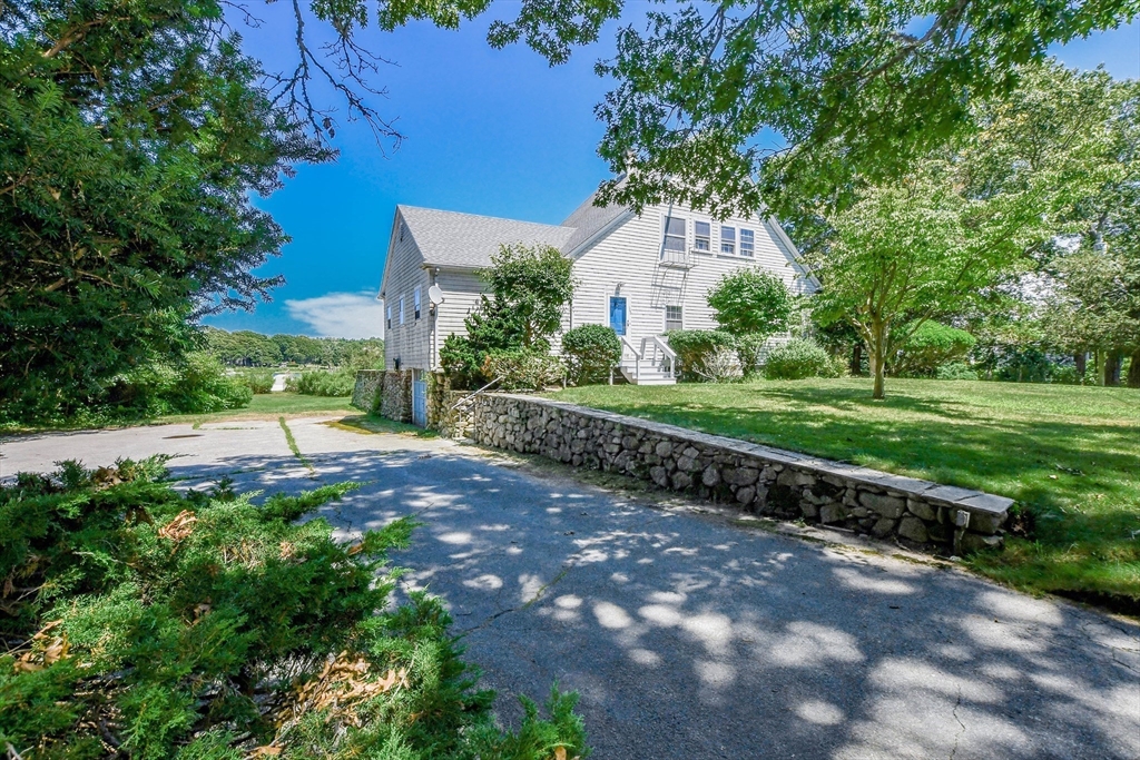 160 Allens Point Road Marion, MA 02738 - Photo 24 of 31 a view of a house with a yard