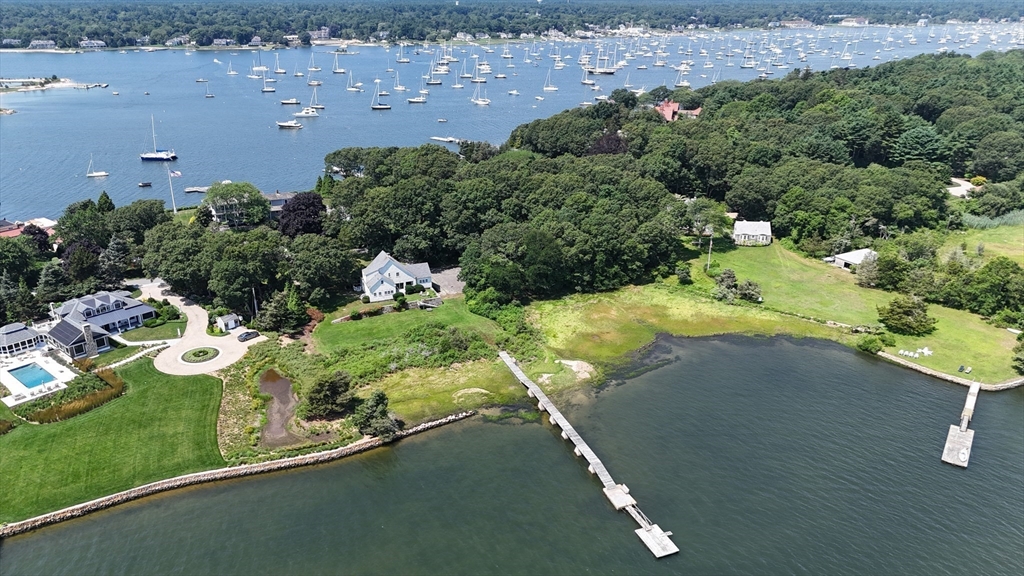 160 Allens Point Road Marion, MA 02738 - Photo 3 of 31 an aerial view of a house with a yard