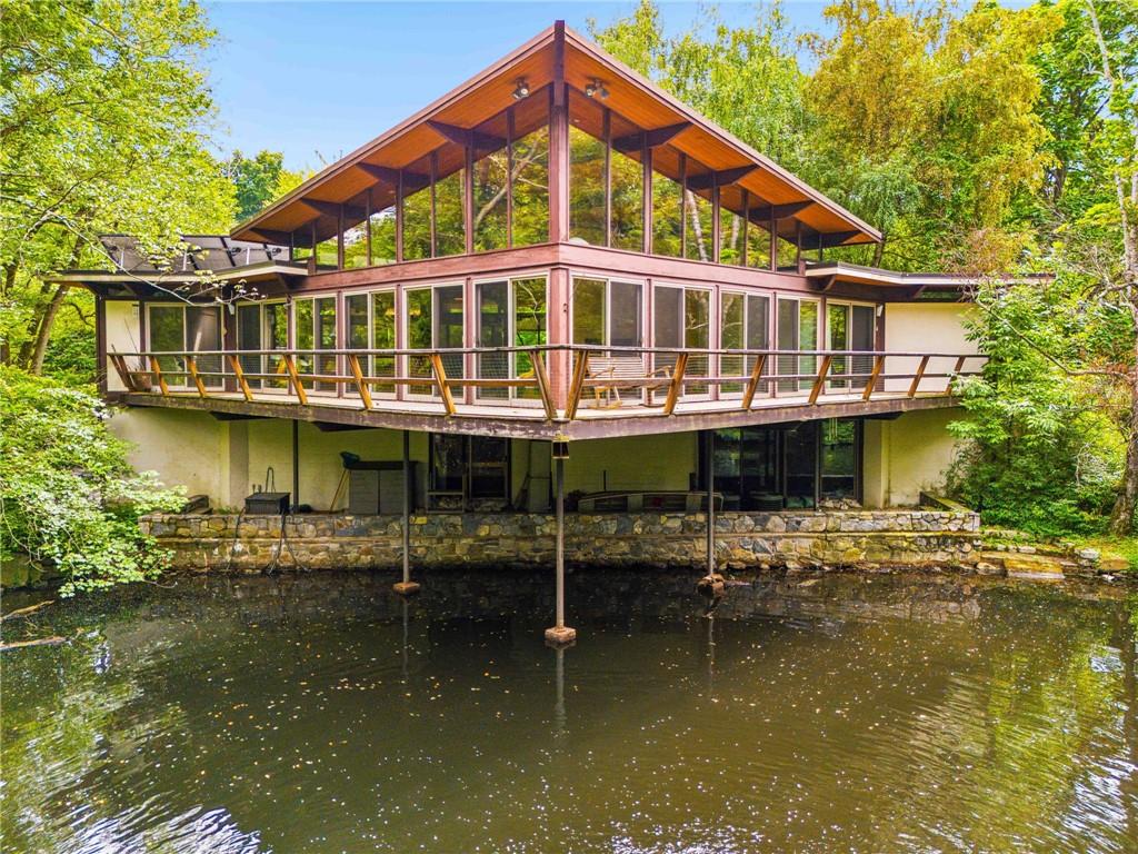 5 Tavano Road Ossining, NY 10562 - Photo 1 of 1 Sensational Mid Century Modern house that juts out over the water.