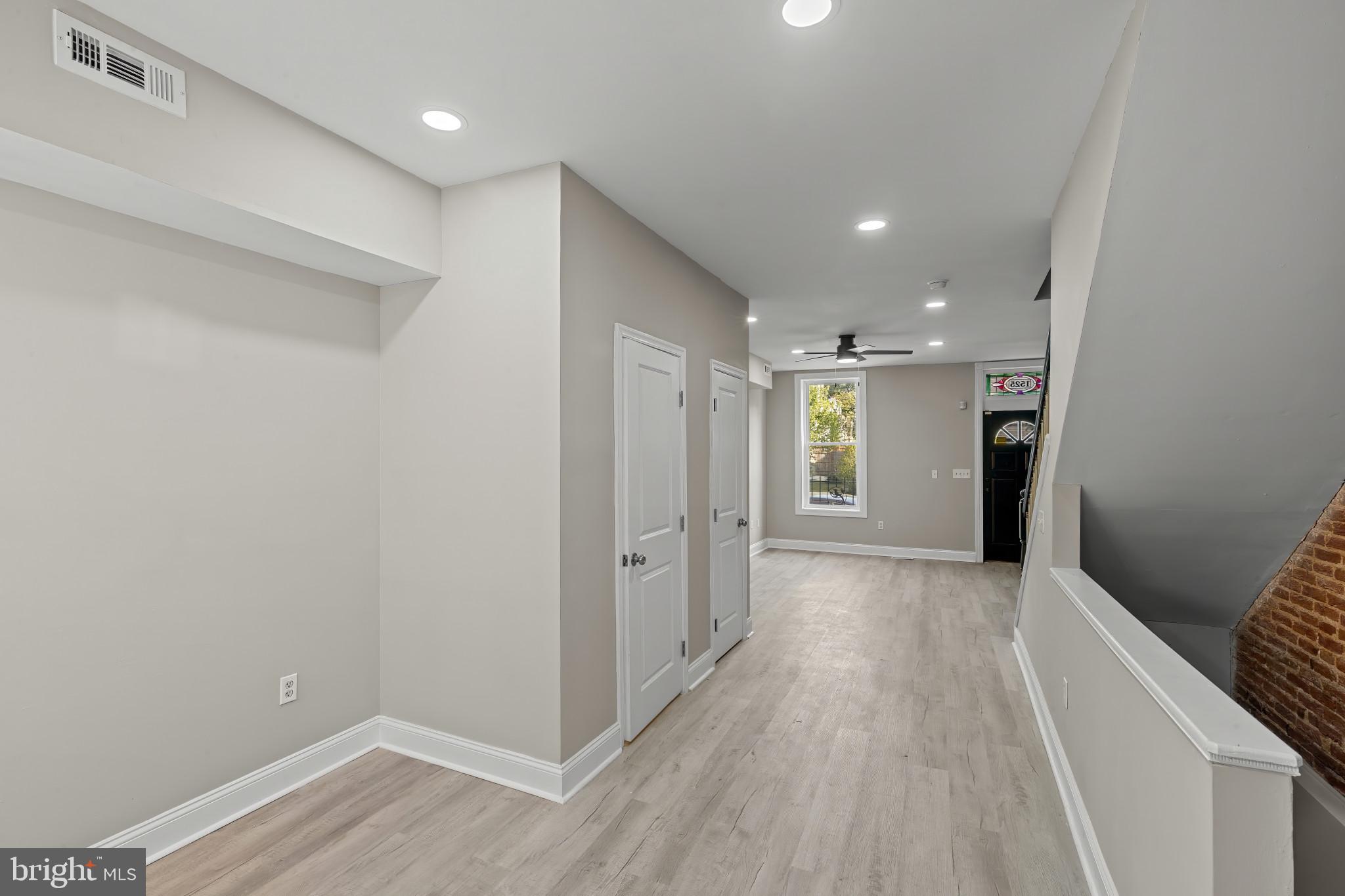 1525 West Pratt Street Baltimore, MD 21223 - Photo 5 of 40 a view of entryway with wooden floor