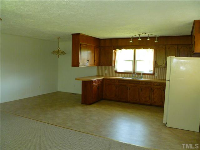 105 Circle B Farm Road Rougemont, NC 27572 - Photo 12 of 22 a view of a kitchen with a sink
