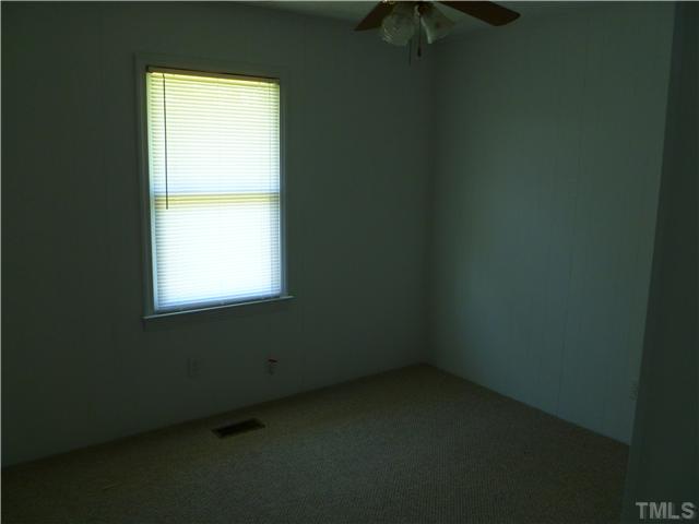 105 Circle B Farm Road Rougemont, NC 27572 - Photo 17 of 22 a view of an empty room with a window