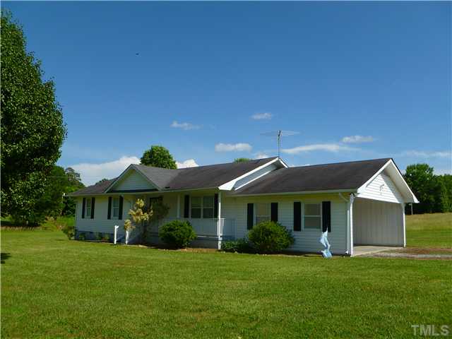 105 Circle B Farm Road Rougemont, NC 27572 - Photo 4 of 22 a front view of a house with a yard