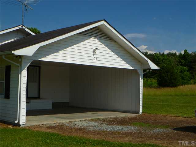 105 Circle B Farm Road Rougemont, NC 27572 - Photo 6 of 22 a backyard of a house