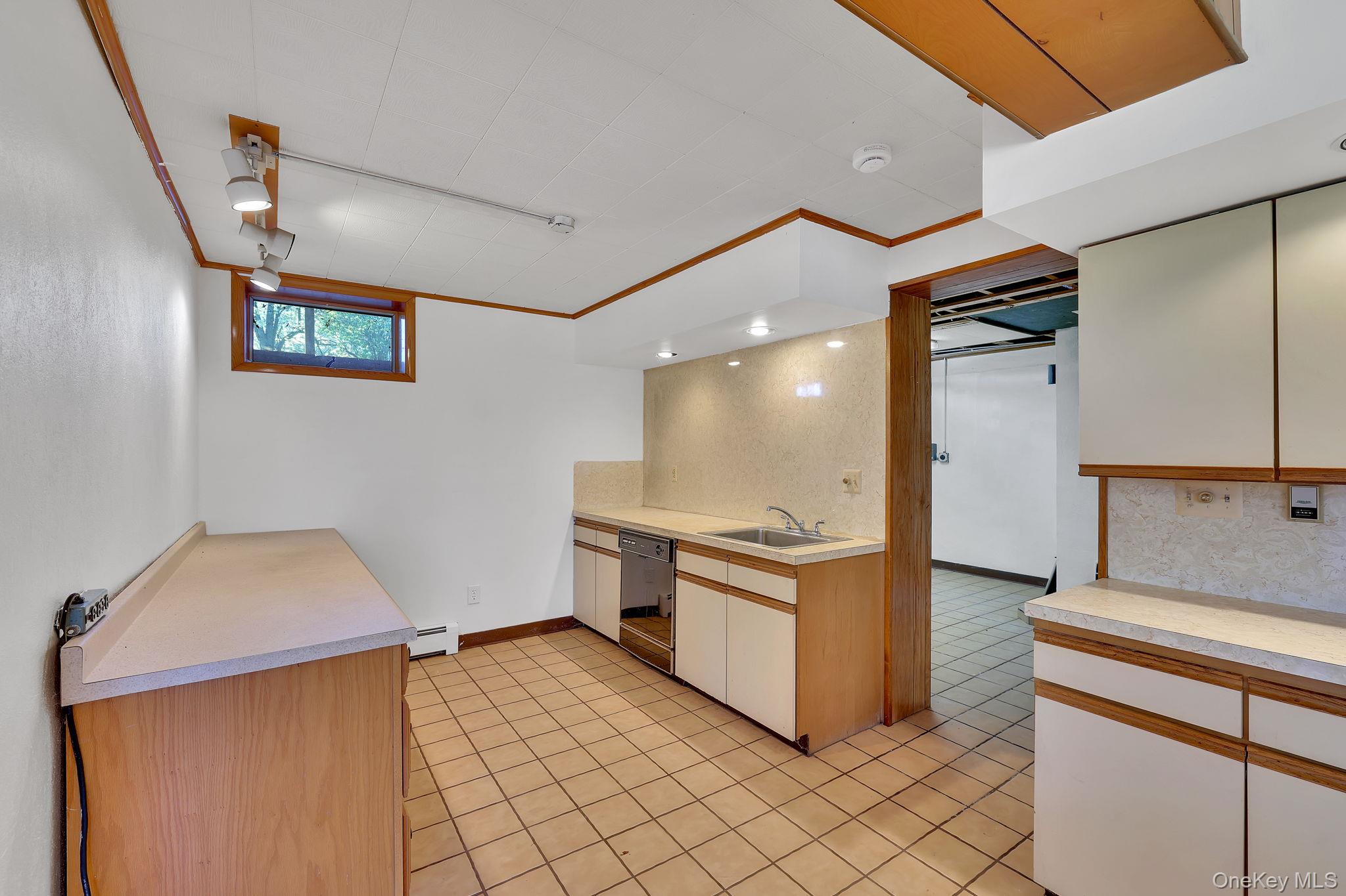 208 Shortcut Road Cochecton, NY 12726 - Photo 26 of 46 a kitchen with stainless steel appliances kitchen island granite countertop a refrigerator and a stove
