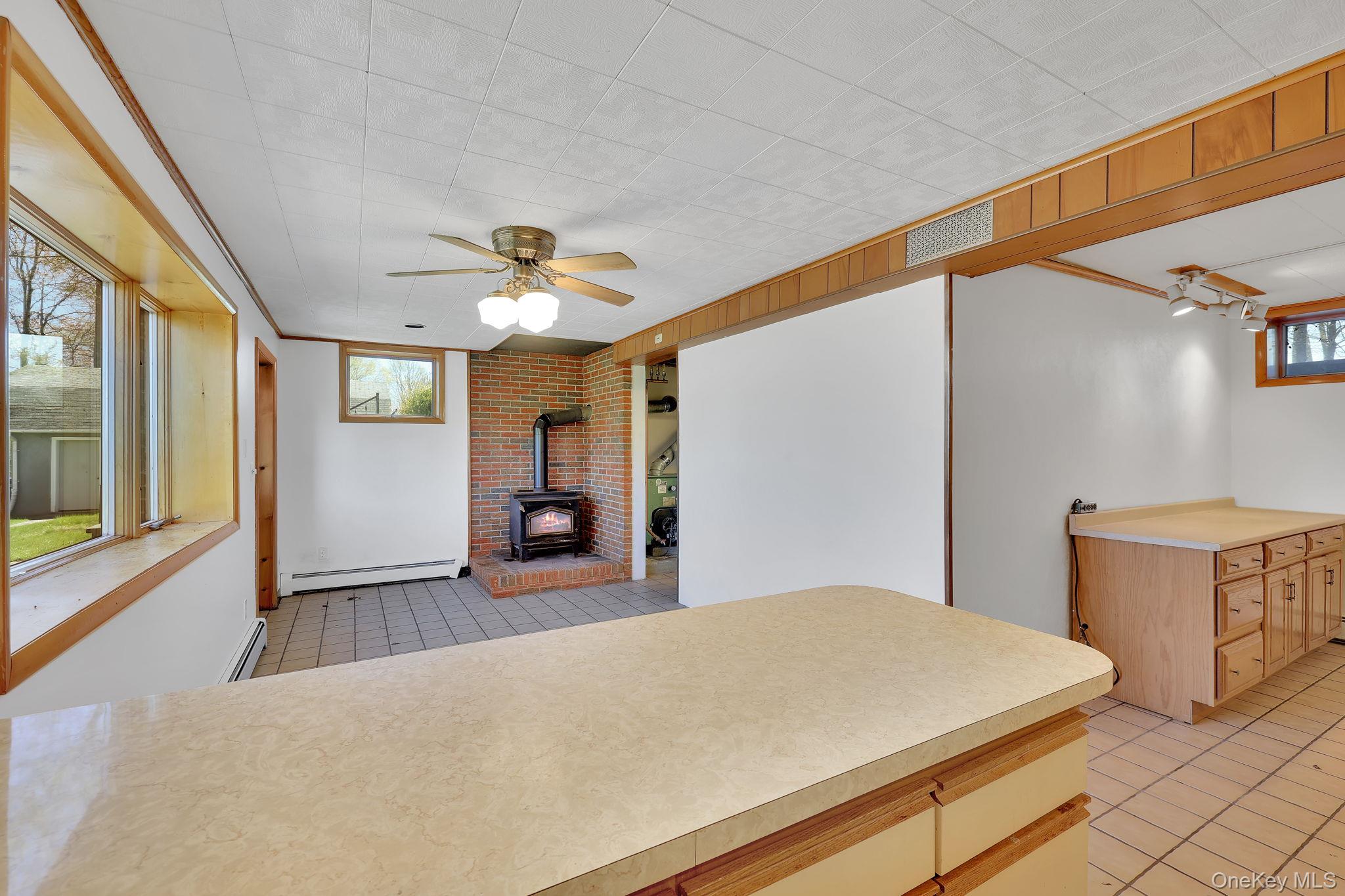 208 Shortcut Road Cochecton, NY 12726 - Photo 27 of 46 a bedroom with furniture and a large window