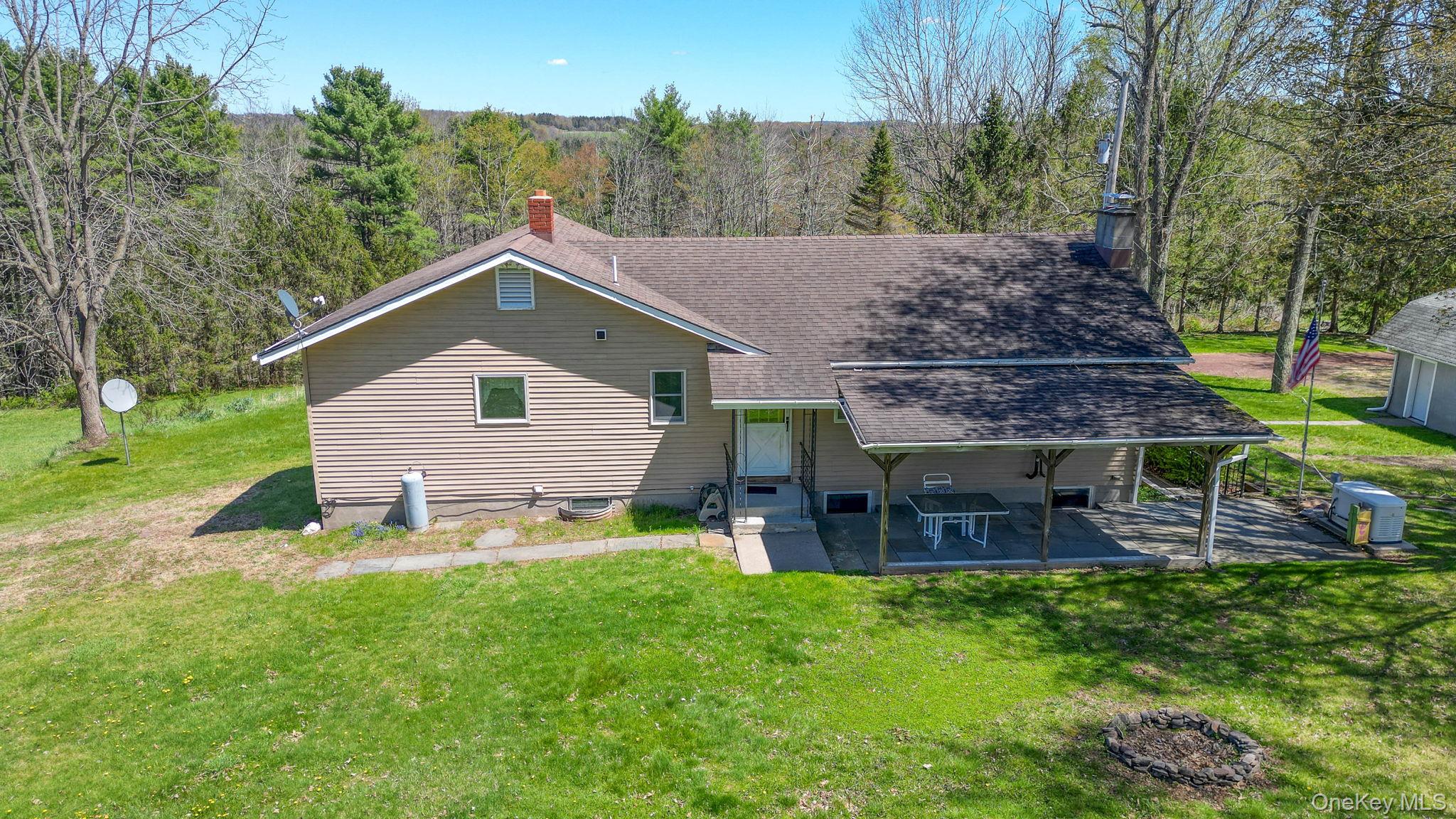 208 Shortcut Road Cochecton, NY 12726 - Photo 37 of 46 a aerial view of a house with a yard