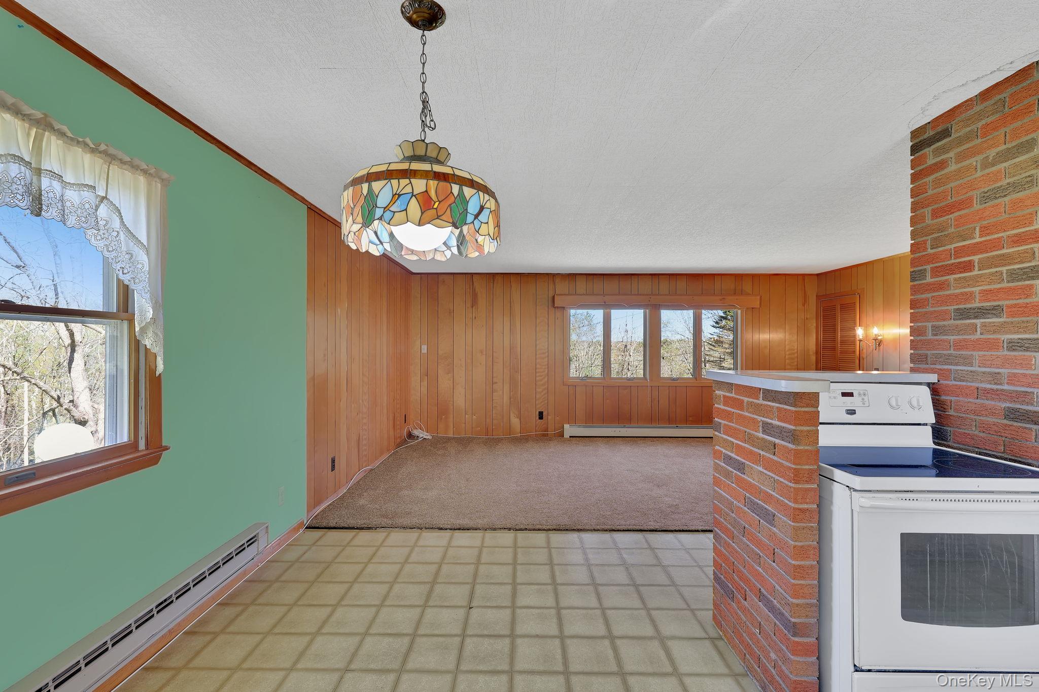 208 Shortcut Road Cochecton, NY 12726 - Photo 10 of 46 a view of an empty room and window
