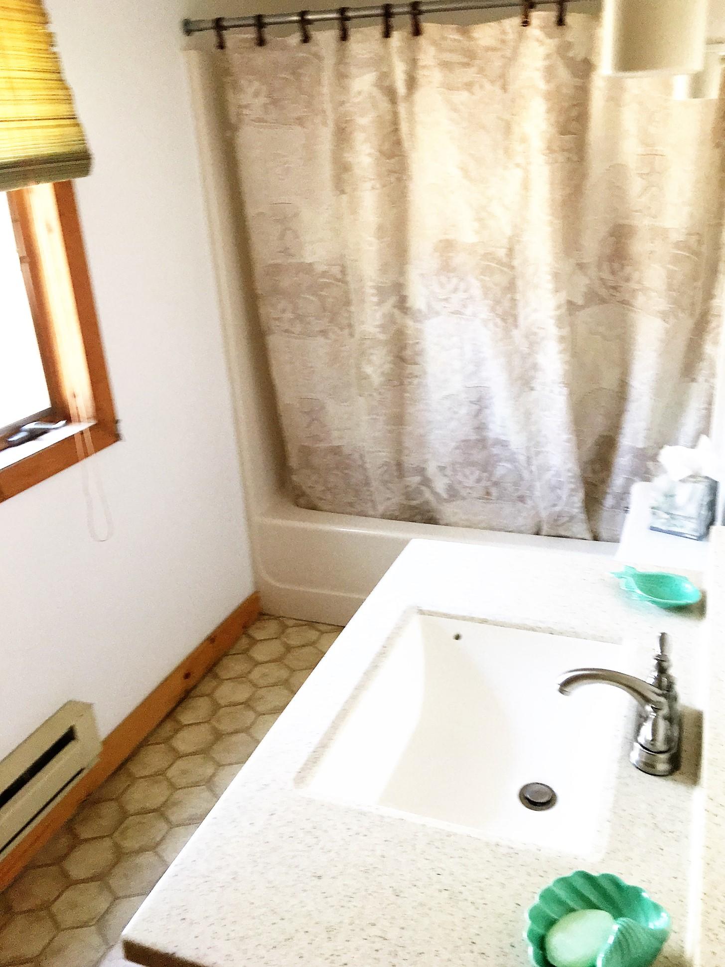 10 Pine Valley Road Wellfleet, MA 02667 - Photo 15 of 27 a bathroom with a bathtub and shower