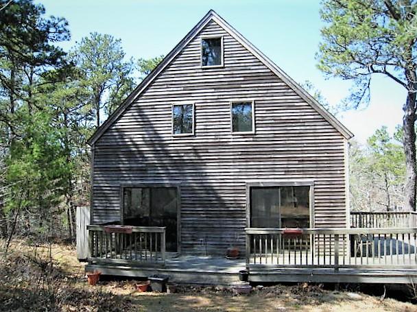10 Pine Valley Road Wellfleet, MA 02667 - Photo 26 of 27 a view of house with a yard and a large tree